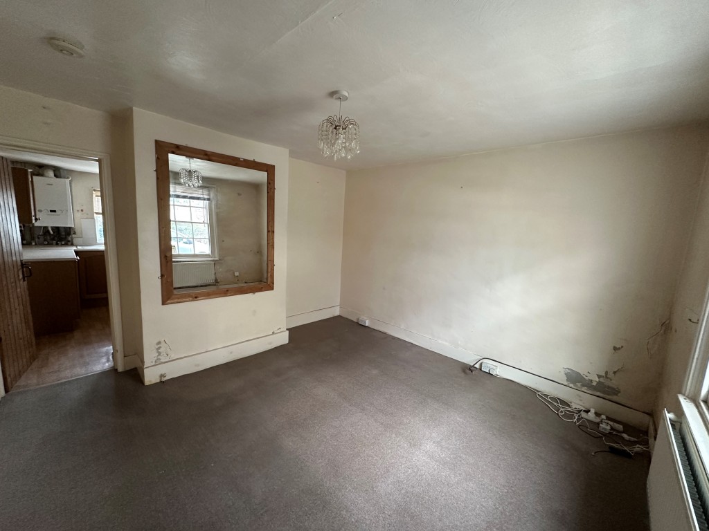Lot: 170 - TWO-BEDROOM TERRACE HOUSE FOR REFURBISHMENT - Living Room